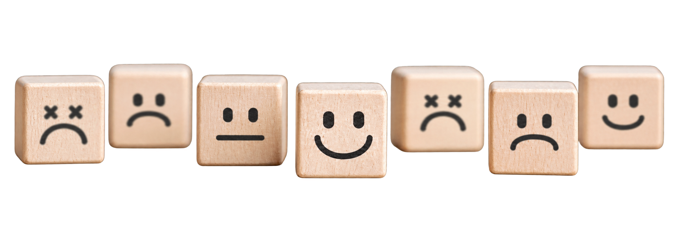 Wooden blocks displaying a range of emotions