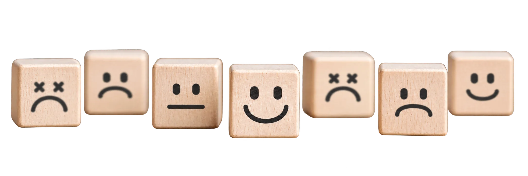 Wooden blocks displaying a range of emotions