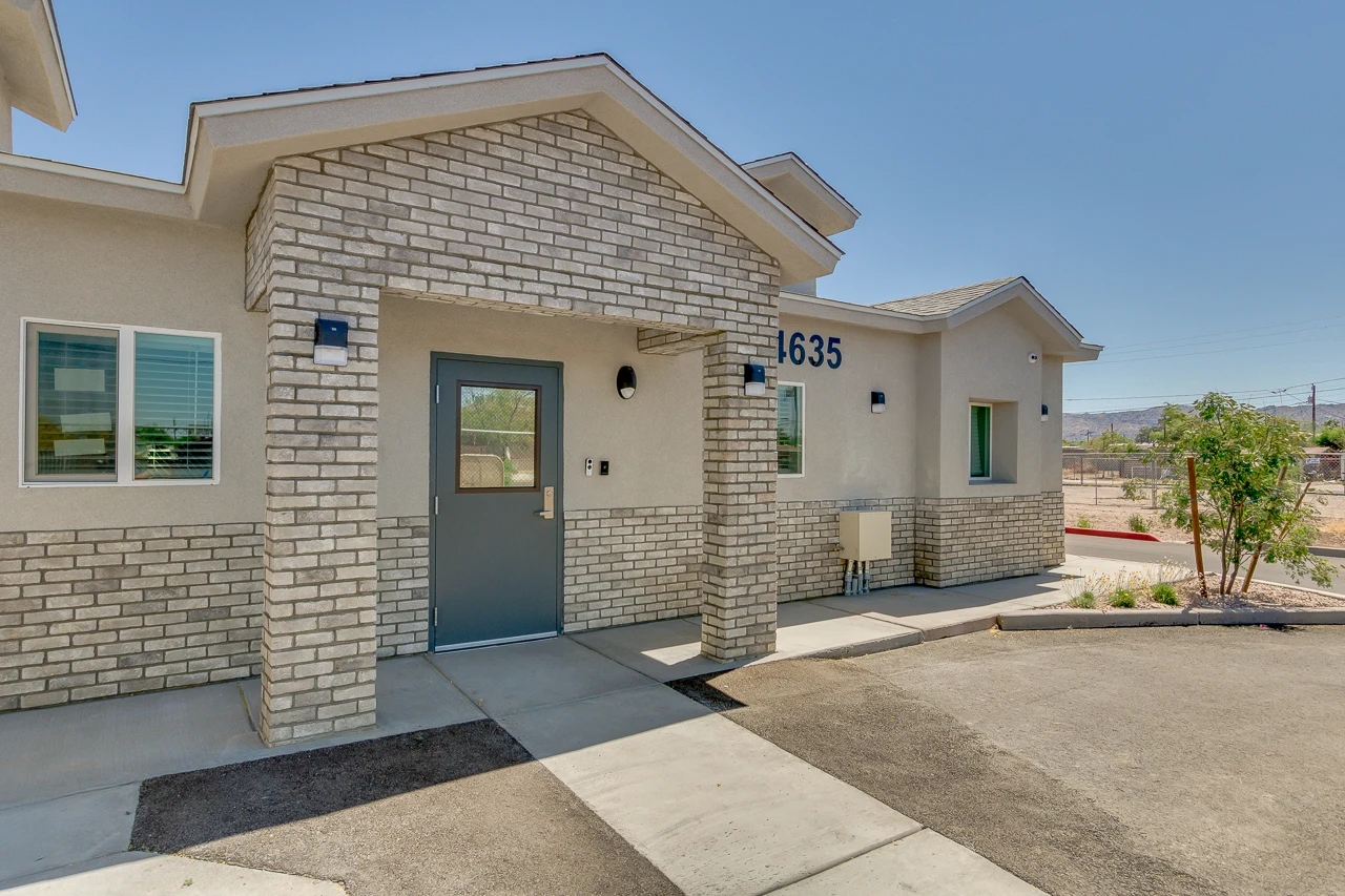 The brick entrance to Trinity’s residential facility